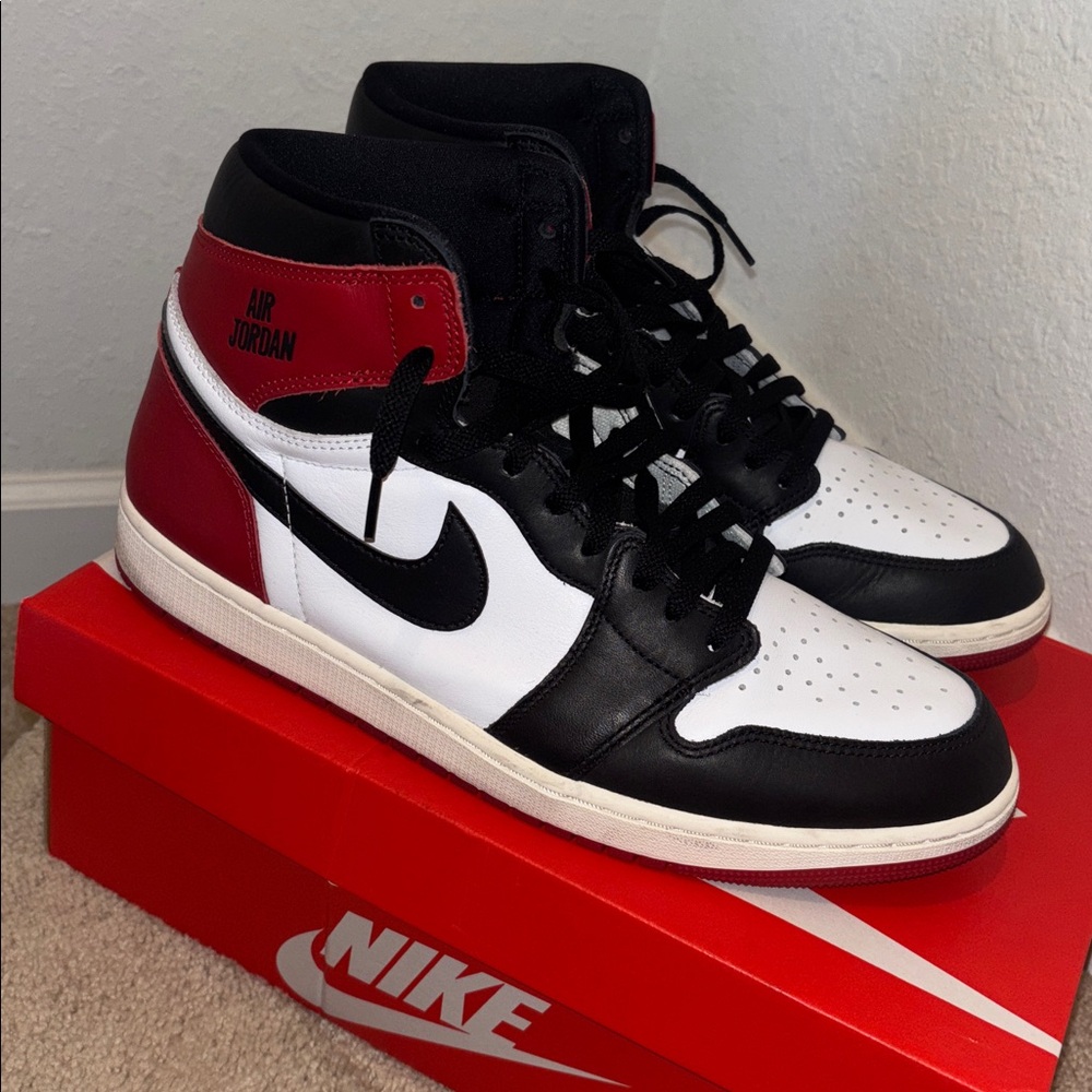 Nike Air Jordan Retro High in Black, White, and Red